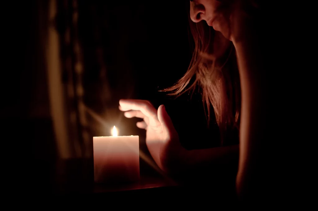 Quick Question #2: Are Candles Bad For Dogs? woman in front of candle